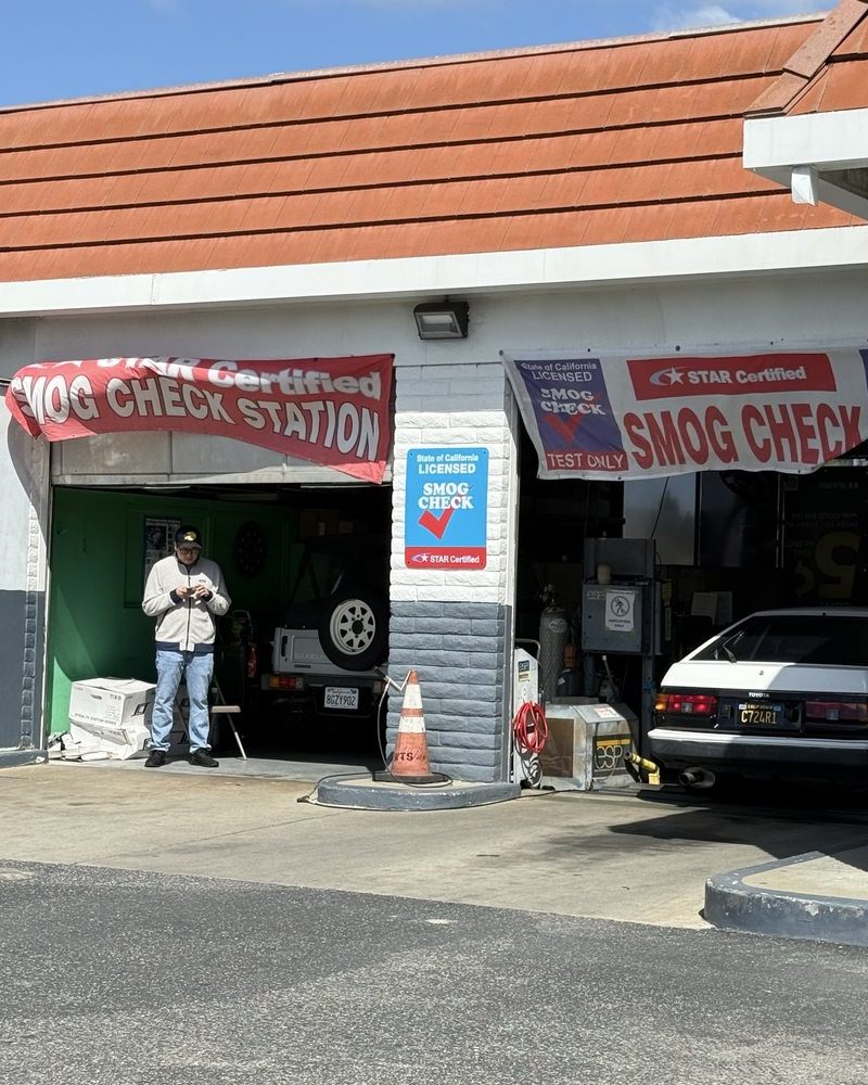 Super Smog test bays in Fremont with STAR Certified Smog Check Station banners